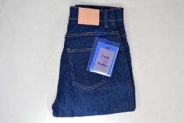 A pair of as new ACNE Studios 1994 indigo jeans (W27/L32).