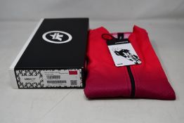 An as new Assos Uma GT C2 Shifter short sleeve cycling jersey in foxyriser pink (L).