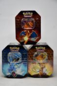 Three sealed as new Pokemon Hidden Fates tins (Complete tin set).