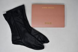 A pair of as new Wolford x Amina Muaddi vegan leather socks (L - RRP £184).