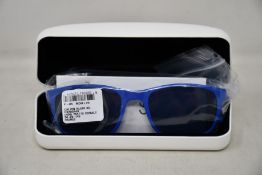 A pair of as new Calvin Klein sunglasses.