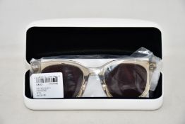 A pair of as new Calvin Klein sunglasses.