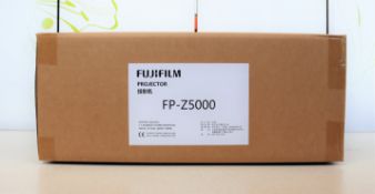 A boxed as new FujiFilm Z5000 5000 Lumen Ultra Short Throw Laser Projector with Rotating Lens (P/