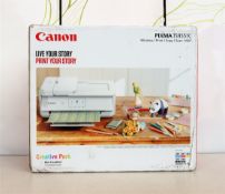 A boxed as new Canon PIXMA TS9551C All-In-One A3 Wireless Printer (Box sealed, damaged box).