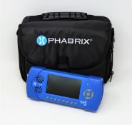 A boxed as new Phabrix PHSXTAGC SxTAG Handheld Test Signal, Analyzer & Monitor with EU power