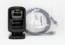 A pre-owned Motorola DS9208 Barcode Scanner with as new cable.