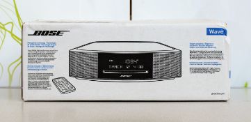 A boxed as new Bose Wave Music System IV in Platinum Silver (M/N: 737251-4300 DAB, 230V UK) (Box