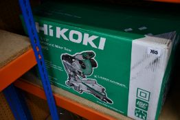 A boxed as new Hikoki C8FSHG slide compound mitre saw.