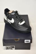 A pair of as new Nike Air Force 1 '07 LV8 3M (UK 5.5).