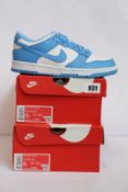 Two pairs of youths as new Nike Dunk Low GS (UK 5.5).