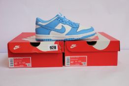 Two pairs of youths as new Nike Dunk Low GS (UK 4).