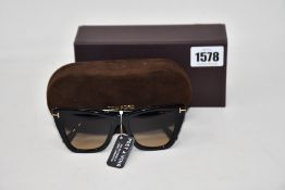 A pair of as new Tom Ford sunglasses.