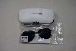 A pair of as new Calvin Klein sunglasses.