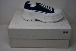 A pair of as new Alexander McQueen sneakers (EU 38).