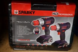 Three boxes of as new Sparky professional heavy duty drill sets (One drill per box).