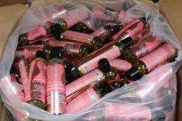 A large quantity of DONA Kissable Massage Oil - Vanilla and Buttercream (Aphrodisiac and pheromone