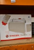 A boxed as new Singer Tradition 2250 sewing machine.