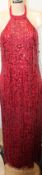 An as new Adrianna Papell sequined high halter sheath ballet dress in cranberry (UK 12/M).