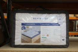 A Schiesser Down Winter Duvet.