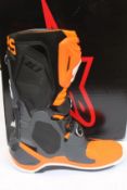 A pair of boxed as new Alpinestars Tech 10 Boots EU 48 (Cool grey and fluorescent orange).