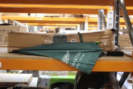 Seventeen Aston Martin Formula One Team Umbrellas (One of the covers has a cut).