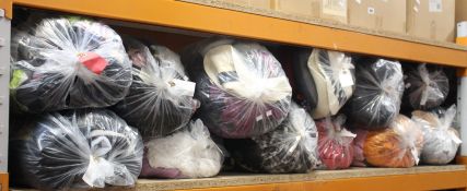 Twelve bags of pre-owned clothing and related items.