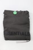 An as new Essentials Fear of God hoodie in washed black with authentication tag (M).