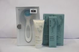 A boxed as new NU SKIN Ageloc Lumispa kit set blue including 1 head and 1 cleanser for oily skin and