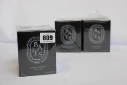 Three Diptyque Baies Bougie parfum scented candles (3 x 300g).