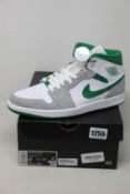 A pair of as new Nike Air Jordan 1 Mid SE with authentication tag (UK 7.5).