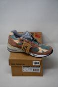 A pair of as new New Balance 991 Patta sneakers (UK 6.5).