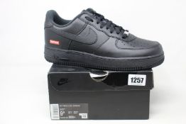A pair of as new Nike Air Force 1 x Supreme (UK 8.5).