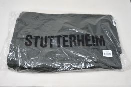 An as new Stutterheim Mosebacke rain coat (XL).