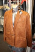 A women's as new Ralph Lauren lamb leather jacket in brown (UK 14).