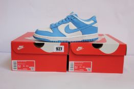 Two pairs of youths as new Nike Dunk Low GS (UK 5).