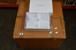 Thirty two as new Baby Bliss Snuggles wrap blankets.