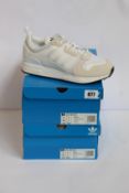Two pairs of as new Adidas ZX 700 HD (UK 7).