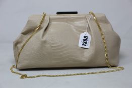 An as new DeMellier London handbag.