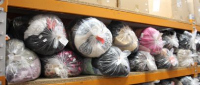 Twelve bags of pre-owned clothing and related items.