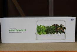 A boxed as new Click and Grow Smart Garden 9.