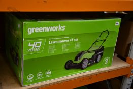 A Greenworks G40LM41 40 Volt Battery Powered Lawnmower.