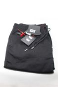 A pair of men's as new Phillip Plein denim jogging trousers (Size 38).