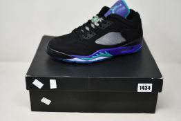 A pair of as new Nike Jordan V Low Golf shoes (UK 11).