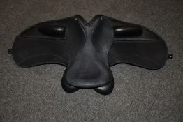 A Custom Saddlery Constanze model dressage saddle: Seat size 17, Tree size 31.3 (List of features