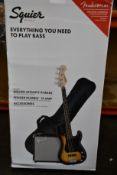 A boxed as new Squire by Fender Affinity PJ bass, Fender Rumbler 15 amp and accessories.