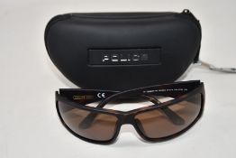 A pair of as new Police sunglasses.