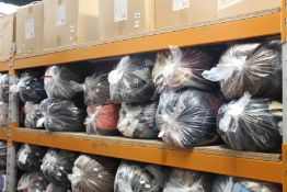 Twelve bags of pre-owned clothing and related items.