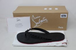 A pair of Christian Louboutin Loubi Flip (EU 41).