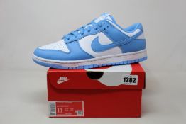 A pair of as new Nike Dunk Low Retro (UK 10).