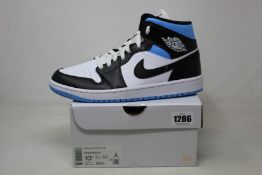 A pair of women's as new Nike Air Jordan 1 Mid (UK 8).
